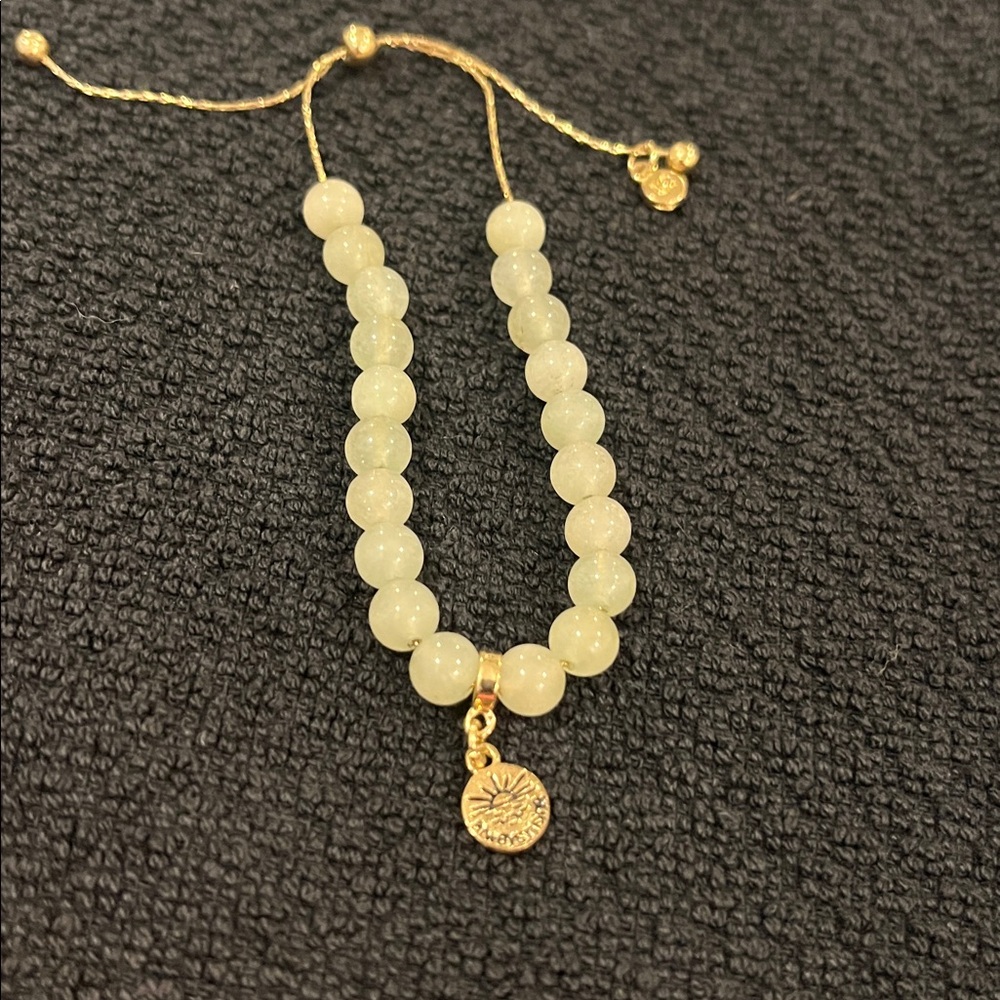 Gold and Cream Beaded Bracelet with Charm